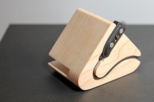 The charging cable, loaded into a third-party "Sidekick" dock (bought on Kickstarter).