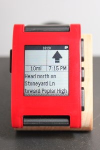 Nav Me on the Pebble. It shows the instruction, direction of travel, distance to the destination and an estimated time of arrival.